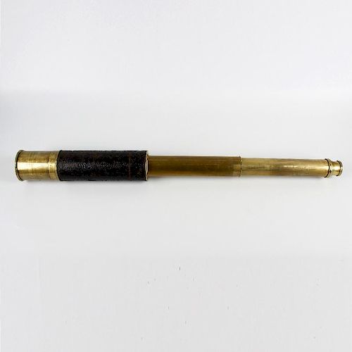 A Victorian brass-bodied three-draw telescope. The black morocco-covered 2.5-inch main barrel with s