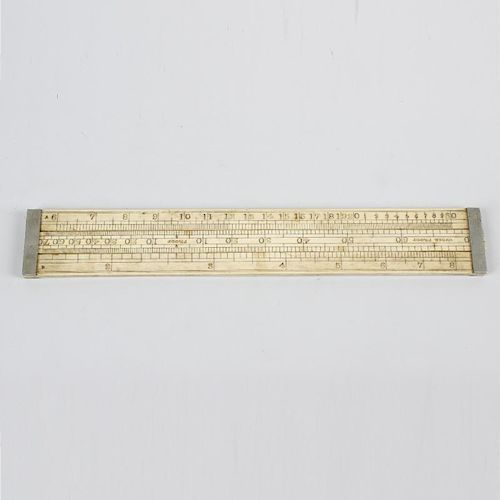 A Victorian ivory slide rule. The edge stamped 'LOFTUS MAKER 321 OXFORD ST. LONDON', of three equal