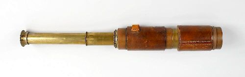 A 19th century hide-bound three-draw telescope With 1.75-inch lens, the unmarked draw tubes within t