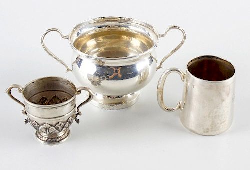 A small selection of silver items, to include an early 20th century christening mug, of tapered form