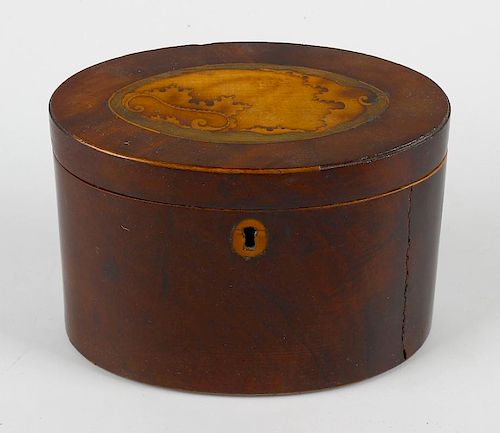 A George III inlaid mahogany oval tea caddy, the hinged cover with harewood and stained lime wood hu