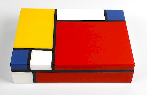 A Mondrian trust lacquered desk box. The rectangular cover decorated in bold geometric design in the
