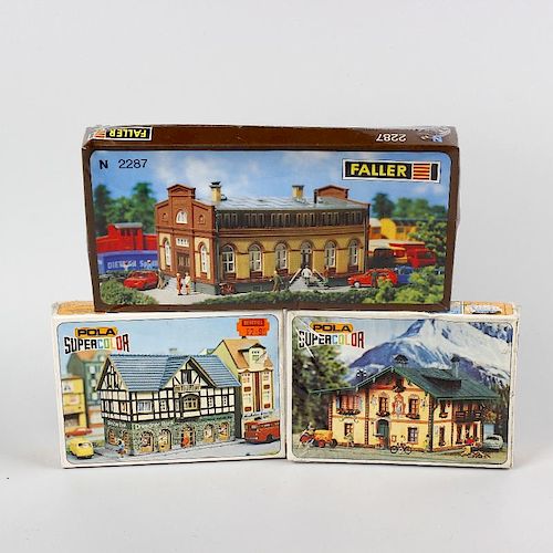 Two boxes containing a good mixed selection of Faller and other N gauge model railway plastic model