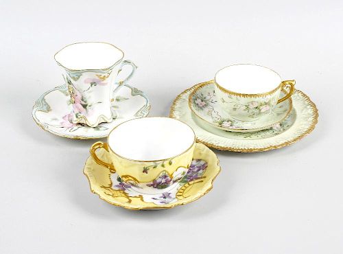 A small box of assorted cabinet porcelain. Cups, saucers and plates, to include Limoges examples, in