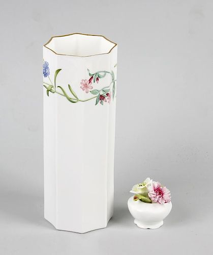 A box containing a Royal Worcester bone china vase, the white glazed ground transfer decorated in th