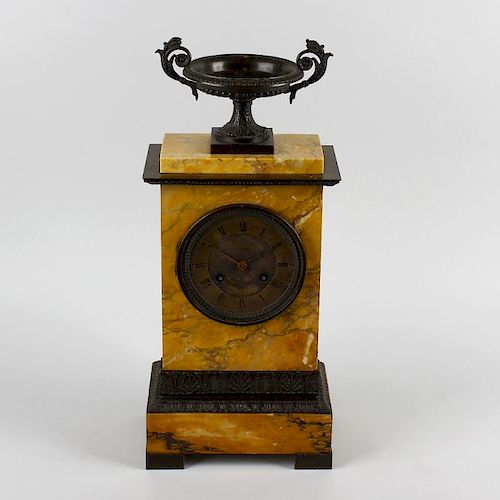 An early to mid 19th century French bronze and sienna marble mantel clock.Pons, Paris.The 3.75-inch