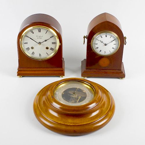 An early 20th century mantel clock and aneroid barometer, the inlaid mahogany clock of lancet arch f