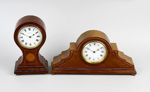 Two early 20th century inlaid mahogany mantel clocks The first of balloon form, retailed by Gilbert