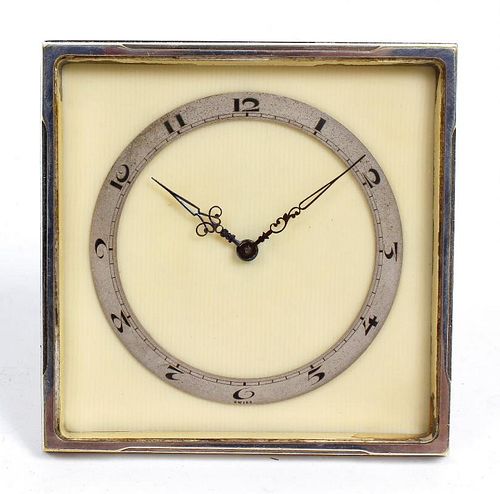 A Swiss Art Deco desk timepiece. The 3-inch Arabic chapter ring and blued steel hands upon a cream p