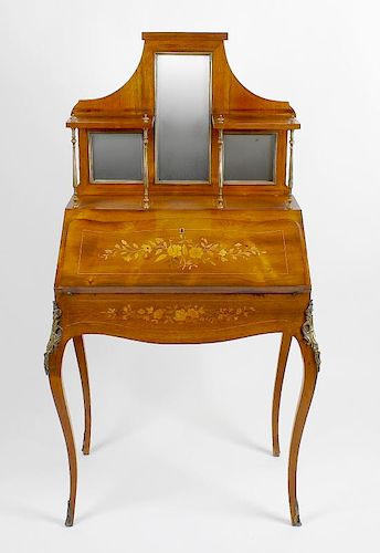 An inlaid rosewood bureau de dame. Circa 1900, the shaped superstructure with central long mirror be