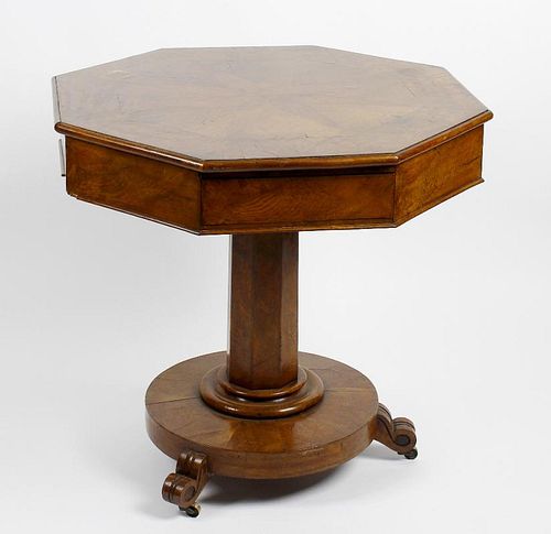 A mid 19th century pollard oak centre drum table The segmented octagonal top with star inlay over fo