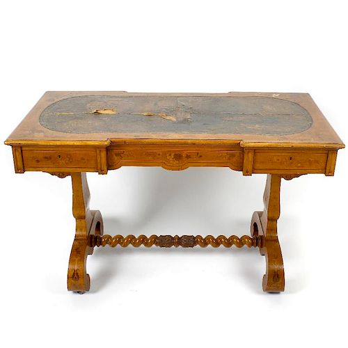A mid 19th century inlaid satinwood library or centre table. The moulded oblong top with inverted br