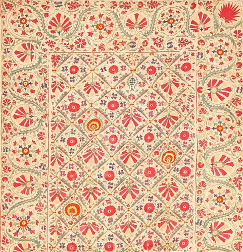 EARLY 19TH CENTURY SUZANI UZBEK TEXTILE. 5 ft 7 in x 5 ft 4 in (1.7 m x 1.63 m).