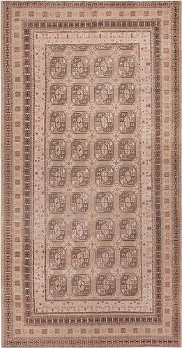 ANTIQUE LONG AND NARROW ORIENTAL KHOTAN RUG - No reserve. 15 ft 1 in x 7 ft 8 in (4.6 m x 2.34 m).