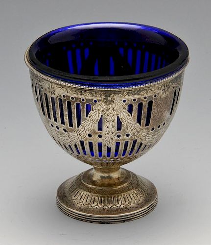 A Victorian silver sugar dish, the conical form with vertical pierced decoration embellished with en