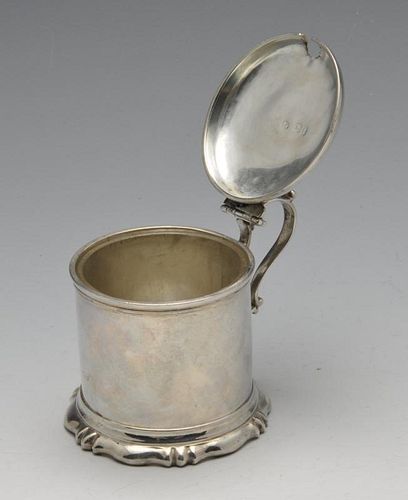 A Victorian silver mustard pot, the plain cylindrical form on fluted spread foot rising to the domed