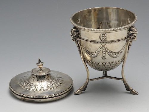 A late Victorian Neoclassical cup and cover, the conical body with swag embossing and raised on a ra