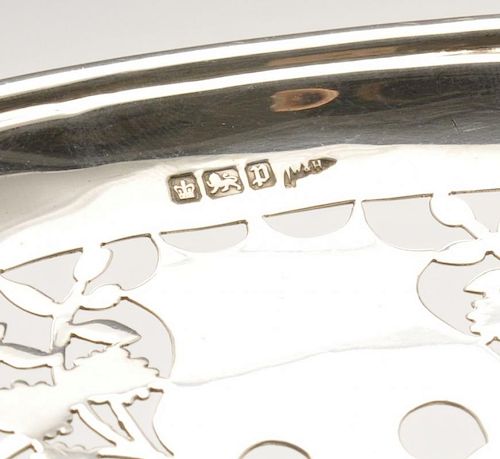 An Edwardian silver tazza, the trefoil pierced bowl on pedestal circular base conforming in decorati