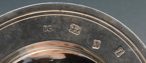 A small modern silver presentation dish, of circular outline having wide rim with personal inscripti