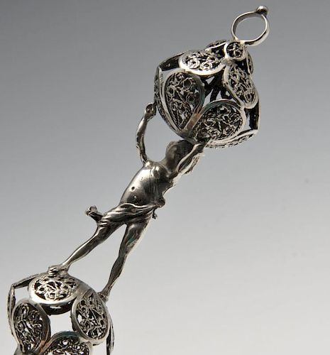A late nineteenth century Russian silver Torah pointer, the tapering form with applied Star of David