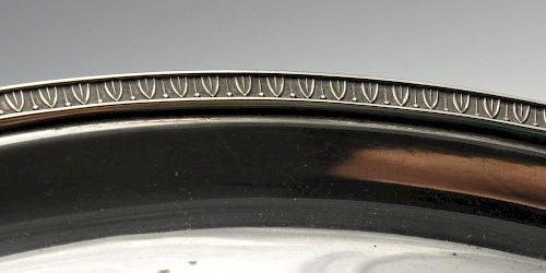A large Italian silver tray, of plain circular form having formal leaf border to rim. Marked 800 bes