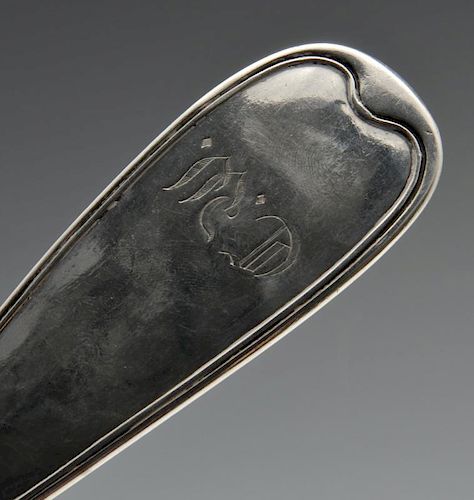 A George IV silver Fiddle pattern fish slice with crested terminal, hallmarked William, Charles & He