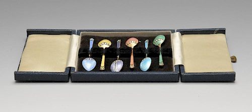 A cased set of six 1960's enamelled silver coffee spoons, decorated to the stems and bowls with styl
