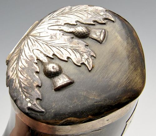 A Scottish horn snuff mull, the hinged cover with silver plated thistle mounts and applied crested s