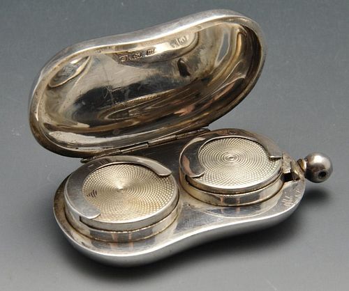 An early twentieth century double sovereign case of plain kidney form, the hinged case opening to tw