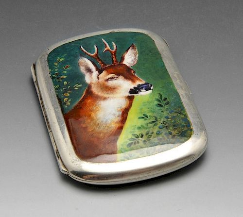 A continental cigarette case, the rounded oblong form with enamel decoration depicting a reindeer an