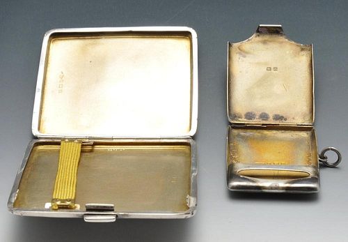 A 1930's silver cigarette case of square form decorated with radiating sun view to the exterior and