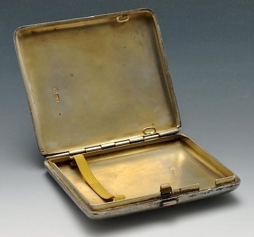 A late nineteenth century Russian silver cigarette case, the oblong form florally engraved with mono