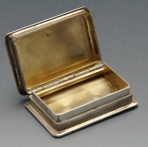 A 1970's silver castle top snuff or pill box, the hinged cover opening to reveal a gilt interior. Ha