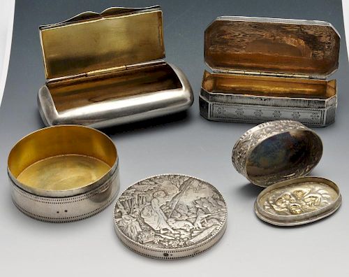An early nineteenth century French silver snuff box, the oblong engraved form with canted corners an