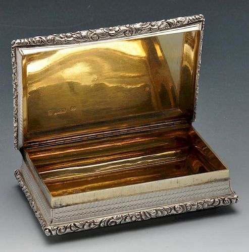 A William IV large silver snuff box by Nathaniel Mills, of rectangular form with engine-turned decor