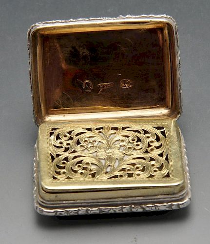 A George IV silver vinaigrette, the oblong form with engine-turned decoration, initialled cartouche,