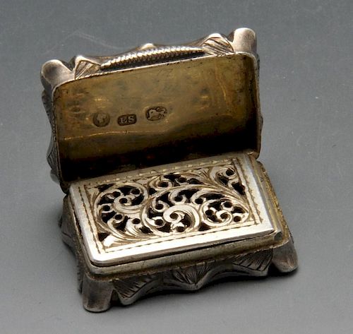 An early Victorian silver vinaigrette, the oblong form with engine-turned decoration, scalloped rim