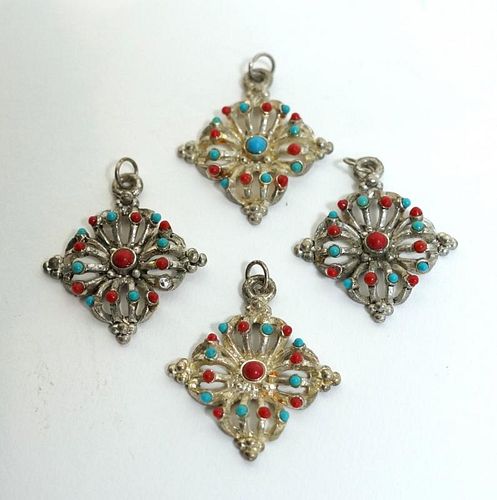 Four Metal Pendants With Blue And Red Beads