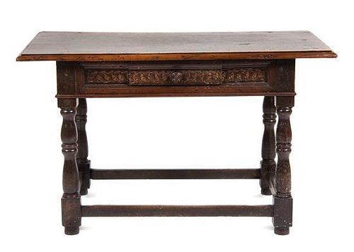 A Jacobean Style Side Table Height 41 x width 23 x depth 25 inches.
