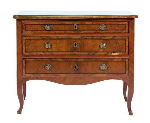 A Continental Burl Walnut Chest of Drawers Height 41 x width 17 1/2 x depth 34 1/2 inches.