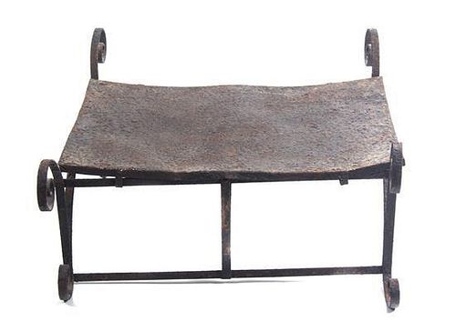 An Iron Stool or Low Table Height 11 1/2 inches x width 24 1/2 inches x depth 16 1/2 inches.