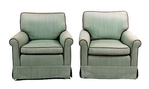 A Pair of Upholstered Armchairs Height 33 x width 32 x depth 28 inches.