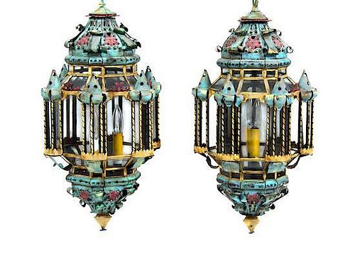 A Pair of Tole and Glass Hanging Lanterns Height 24 1/2 inches.