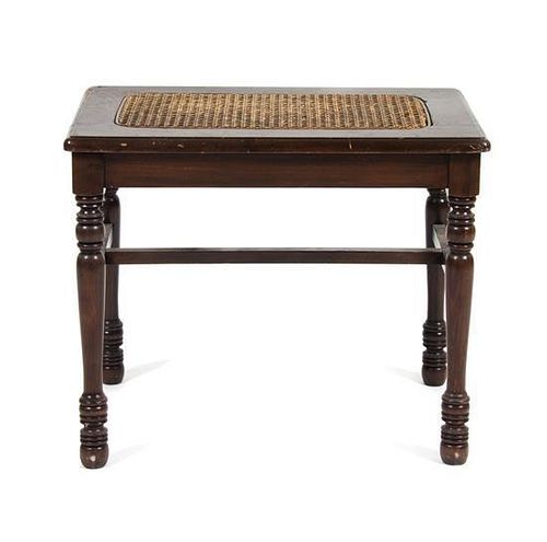 A Mahogany Wicker Seat Stool Height 22 x width 15 x depth 22 1/2 inches.