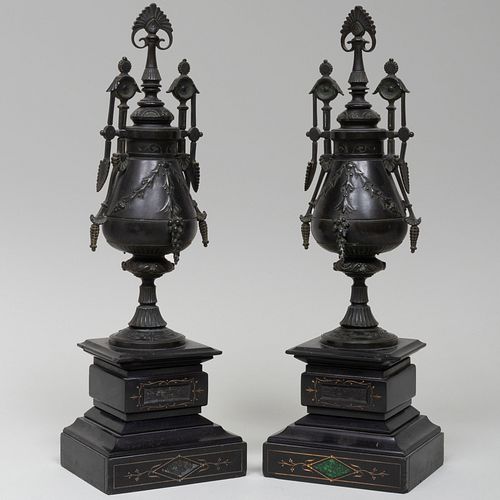 Pair of Neo-Grec Bronze Covered Urns on Black Marble Bases