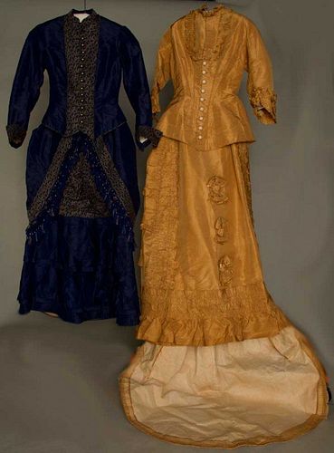 TWO SILK BUSTLE DAY DRESSES, 1870s & 1880s