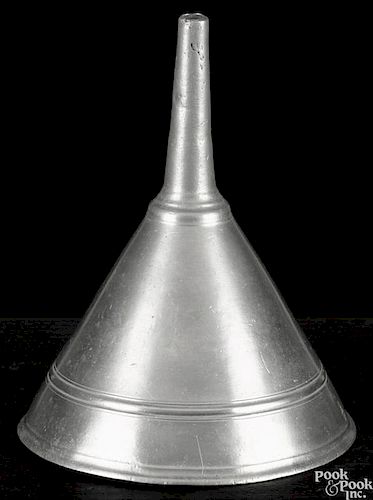 New York pewter funnel, ca. 1775, bearing the touch of Frederick Bassett, 7'' h., 5 3/4'' w.