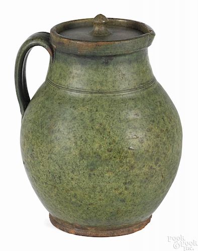 Bristol, Massachusetts redware pitcher and cover, early 19th c., with speckled green glaze