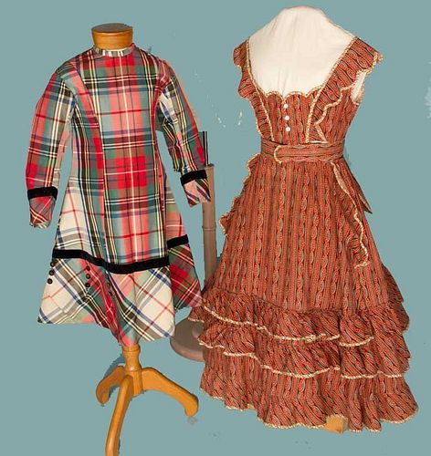 TWO GIRLS' BUSTLE DRESSES, 1860-1870s
