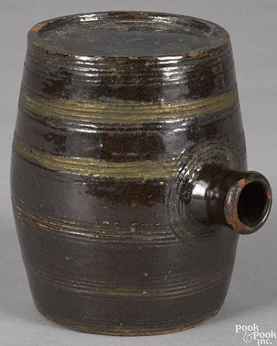 Pennsylvania redware rundlet, 19th c., with incised squiggle ''X'' in ends, and incised bands